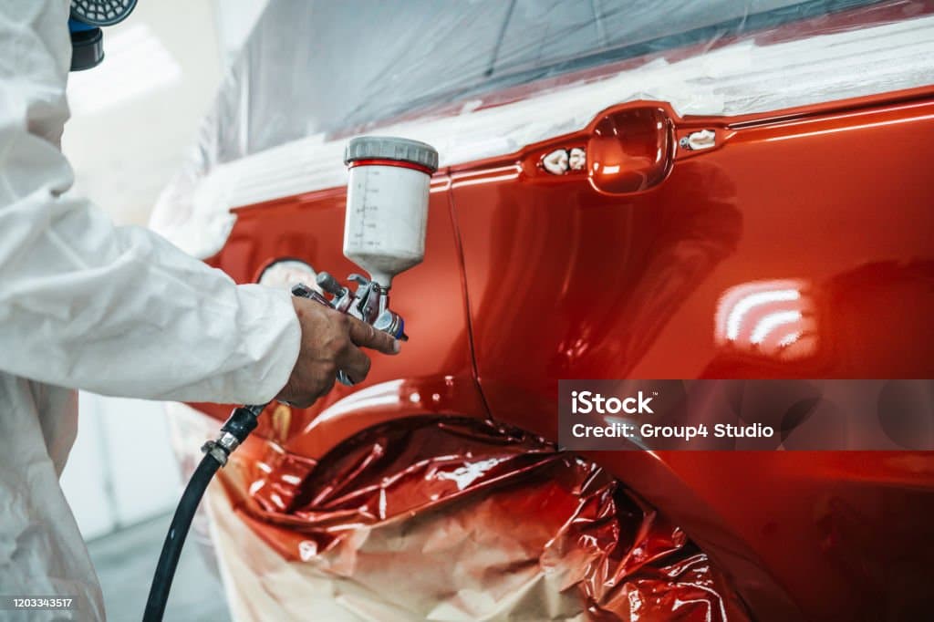 Two component polyurethane automotive coating spray application