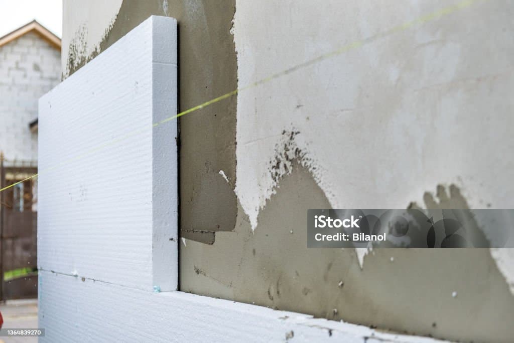 Rigid polyurethane insulation panel manufacturing